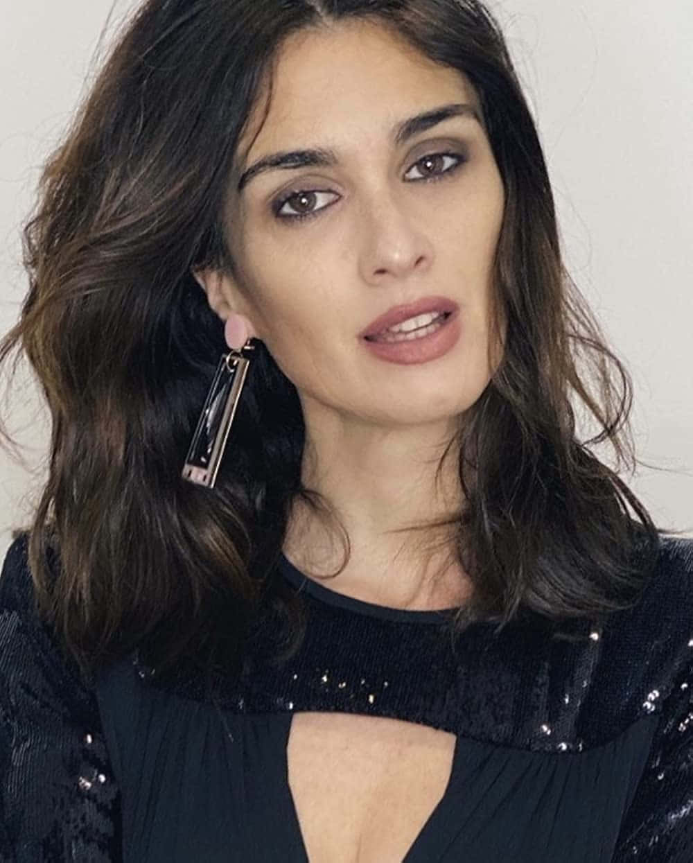 Paz Vega Radiates Elegance in Striking Portrait Wallpaper