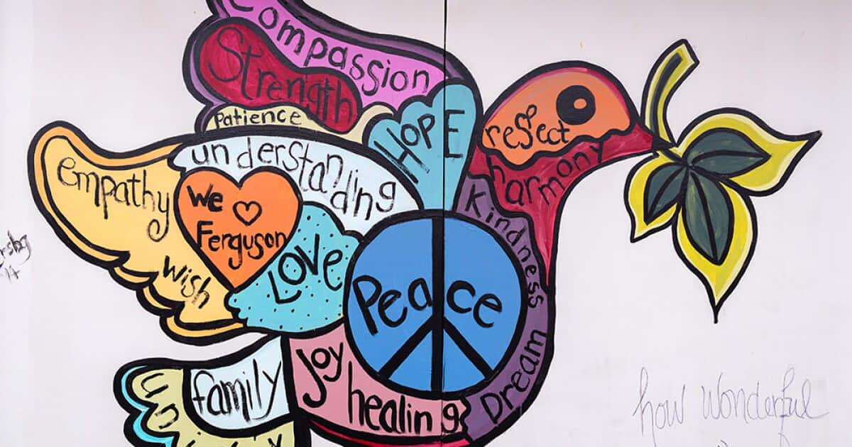A Mural Of A Dove With Peace Signs On It