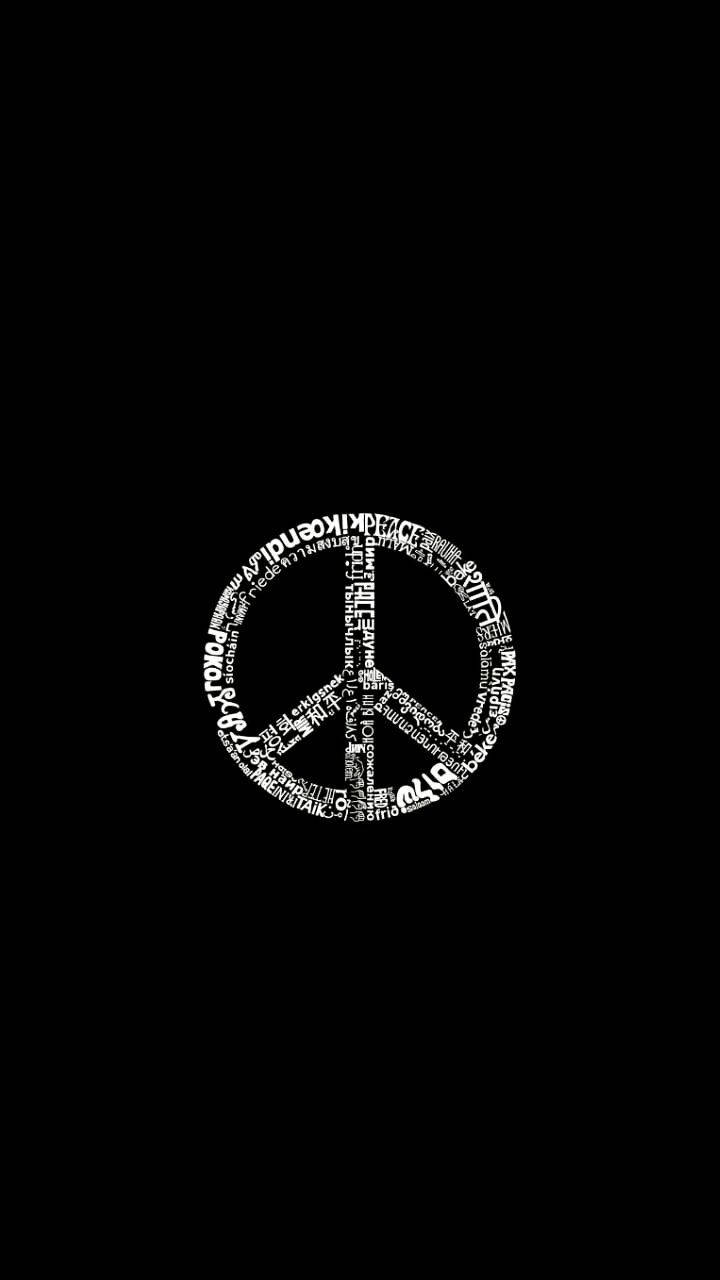 Peace Symbol Typography In Solid Black Wallpaper