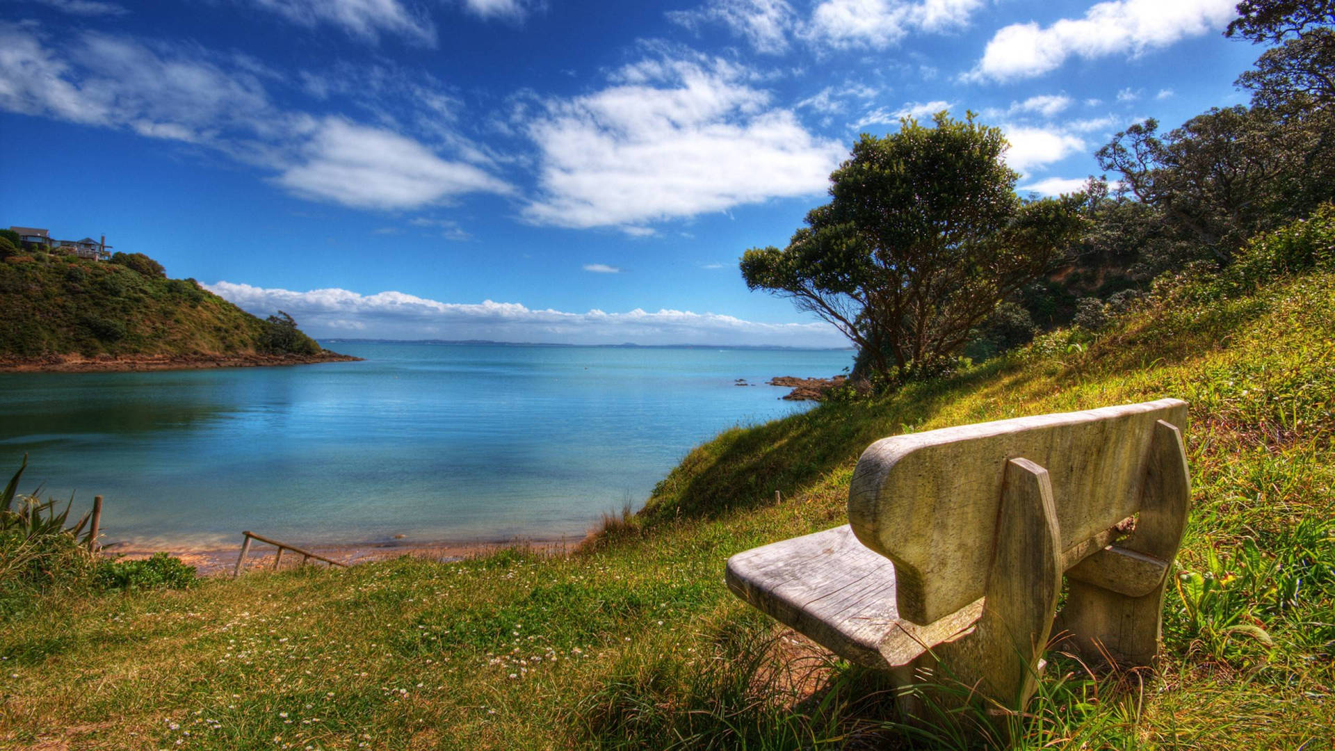 Peaceful Bench By The Ocean Wallpaper