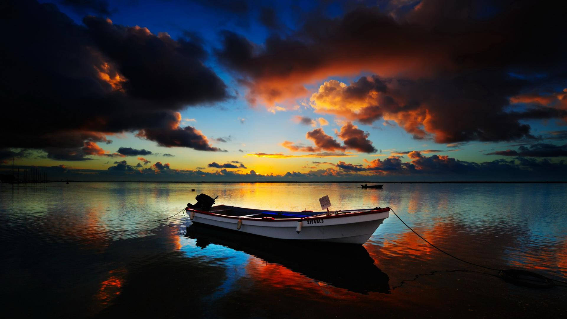 Peaceful Darkened Sky Over A Boat