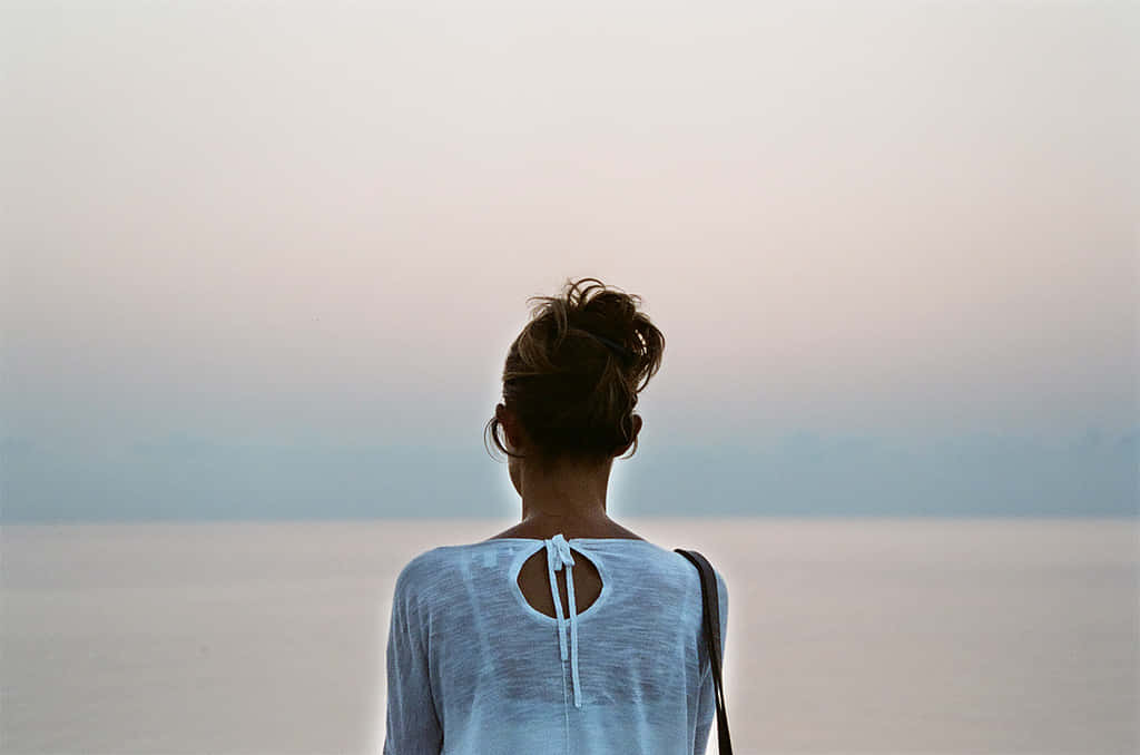 Woman Back View On Peaceful Ocean Picture