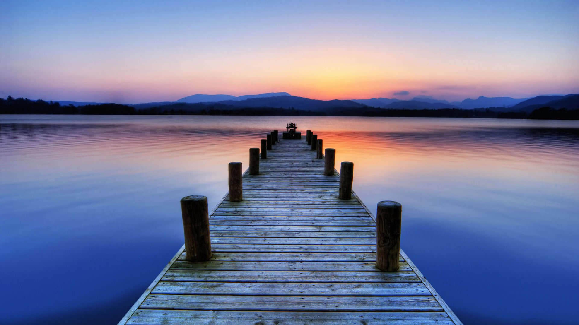Peaceful Wooden Dock By The Lake Wallpaper
