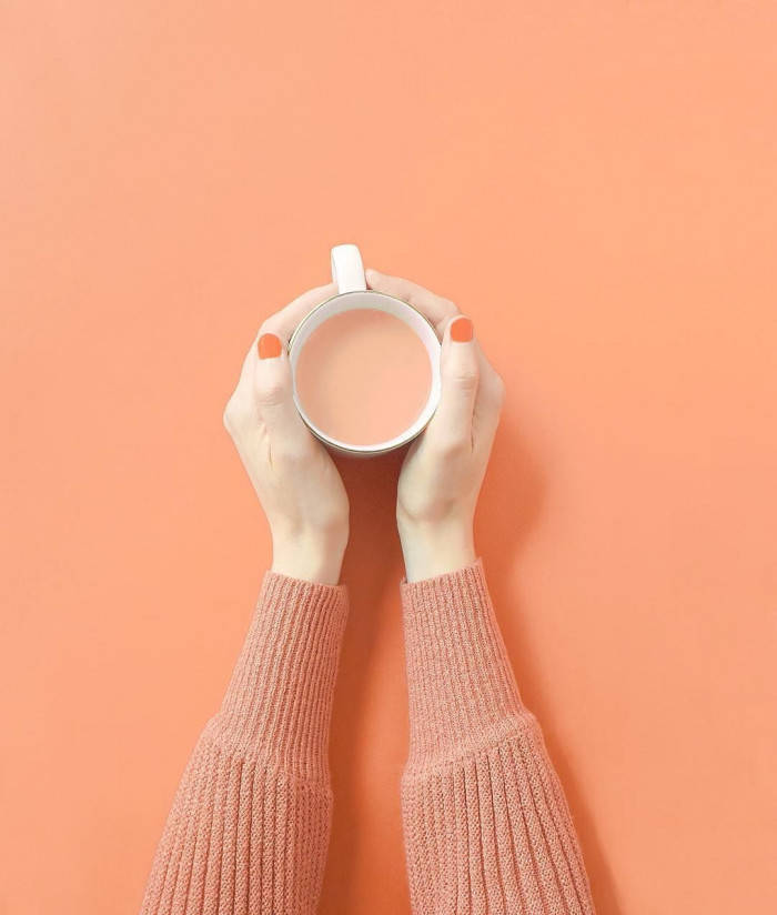 Peach Color Aesthetic Drink In White Mug Wallpaper