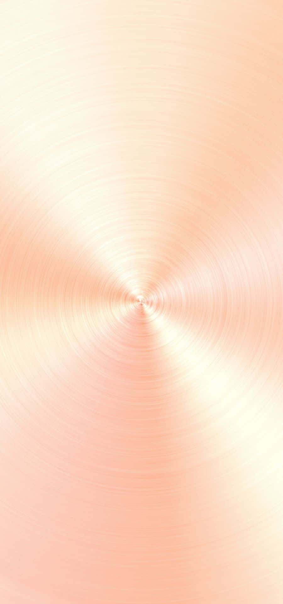 En pink metallisk baggrund med et cirkulært mønster