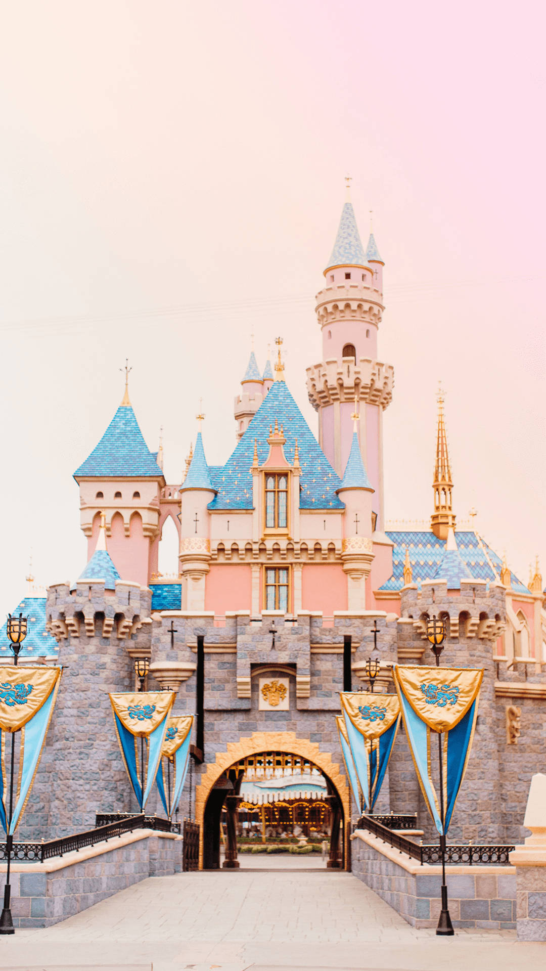 Download Peach-colored Disney Castle Wallpaper 