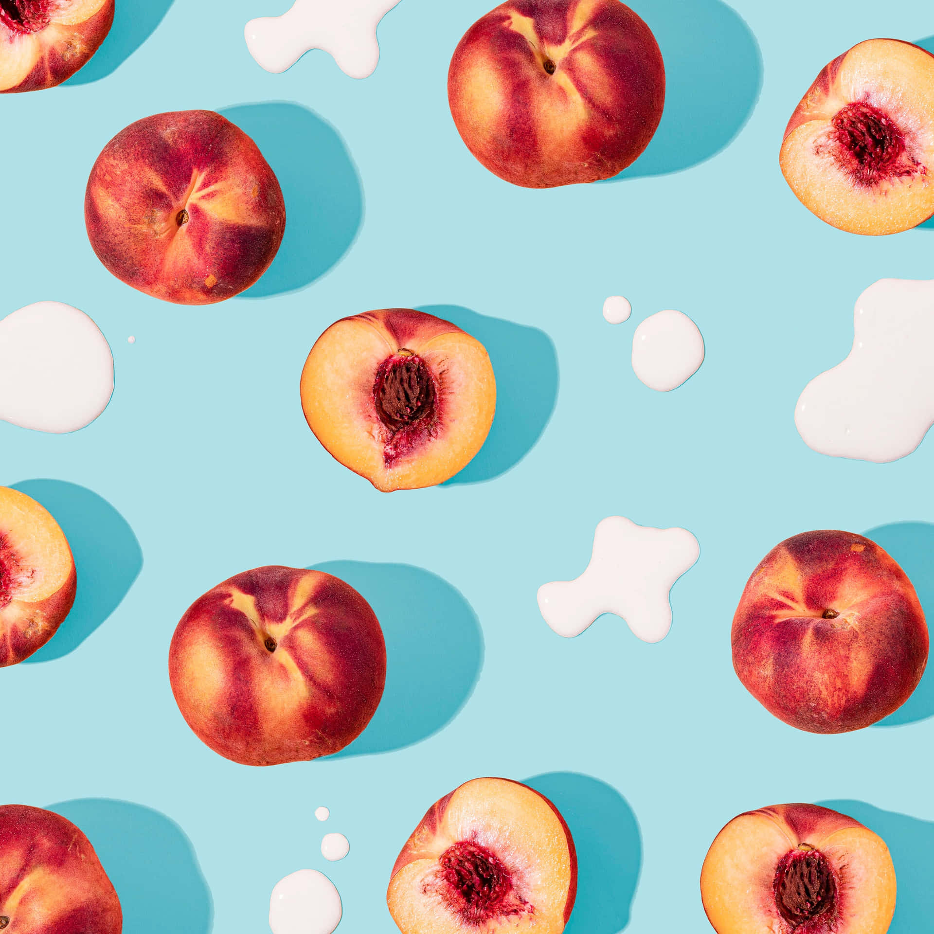 A Pattern Of Peaches On A Blue Background