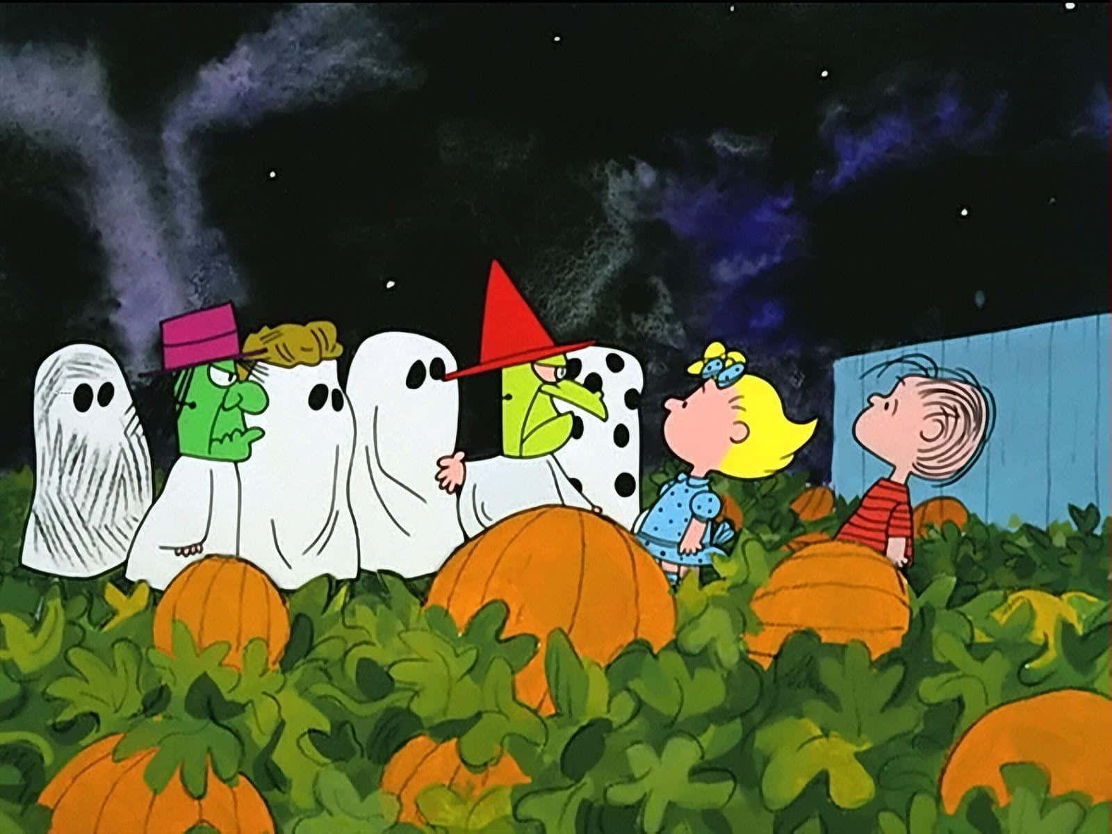 Charlie Brown And His Friends Are In A Pumpkin Patch Wallpaper
