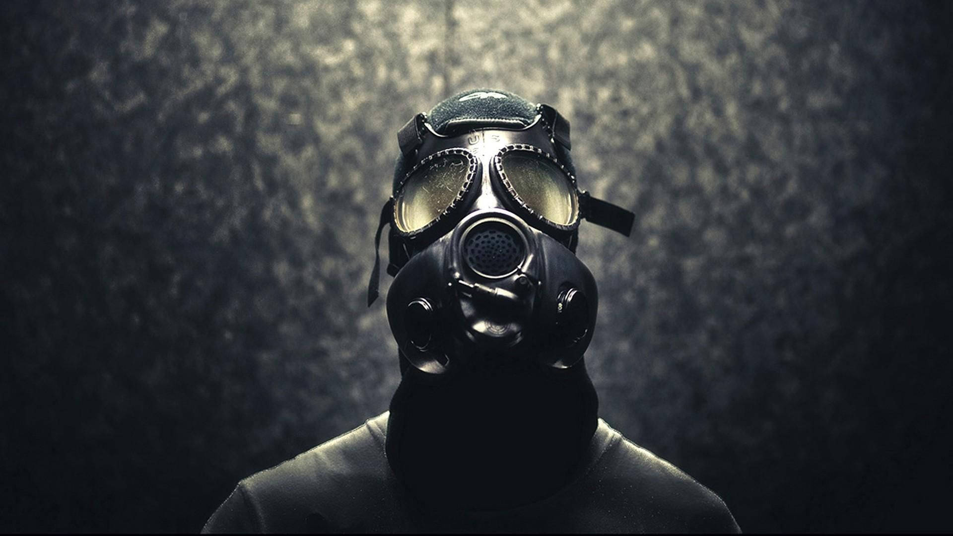 Peculiar Man In Full Gas Mask Wallpaper