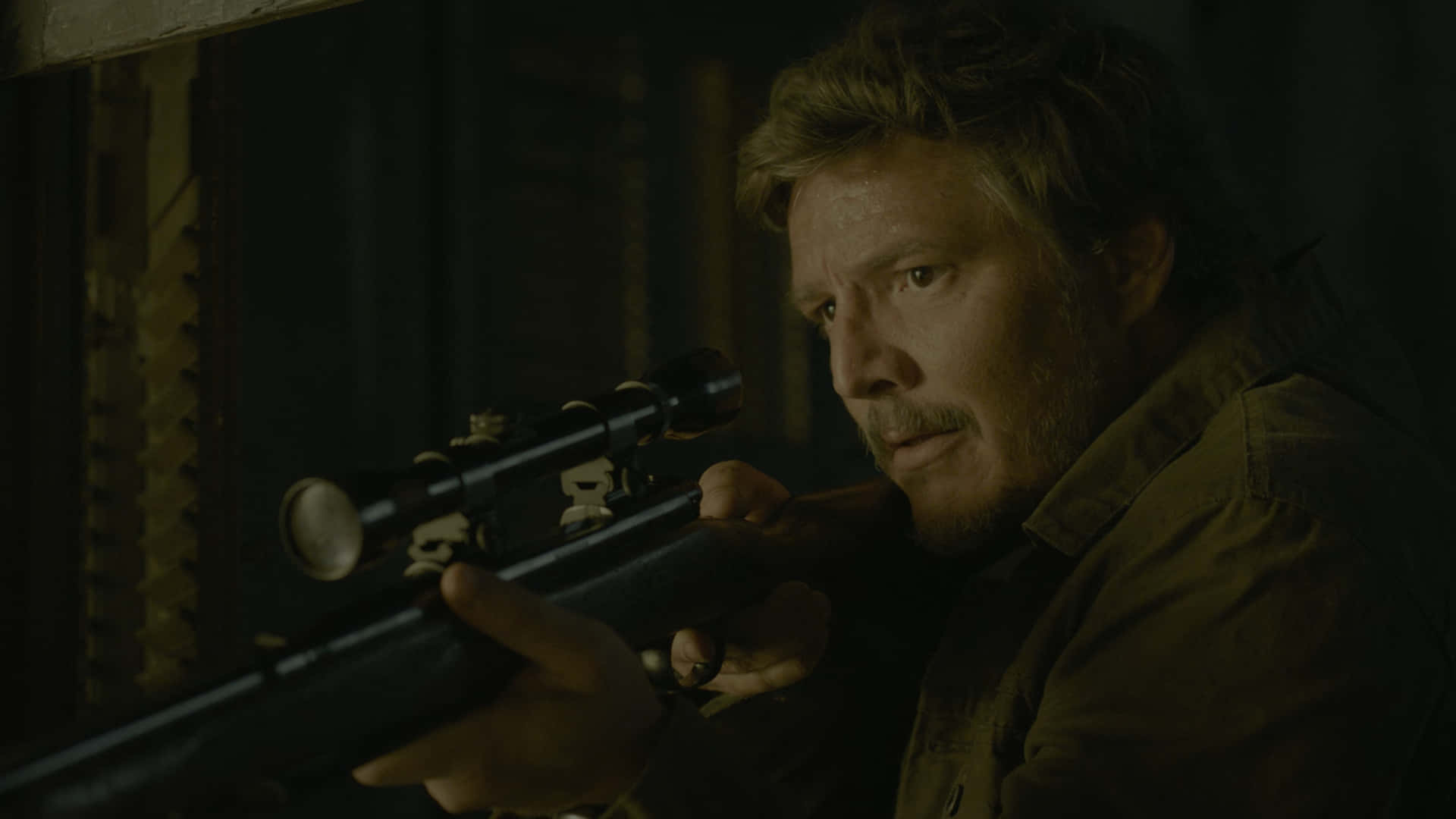 Pedro Pascal Aiming Rifle Wallpaper