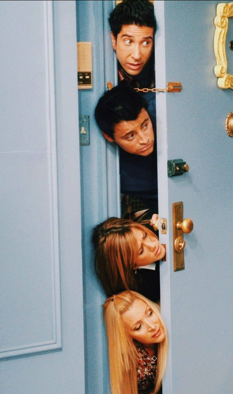 Iconic Door Peek Scene from Friends TV Show Wallpaper
