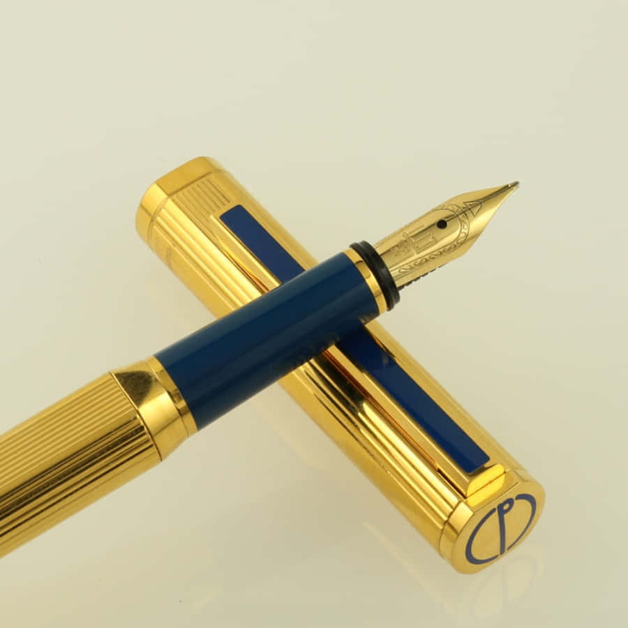 A Gold And Blue Fountain Pen With A Gold Nib