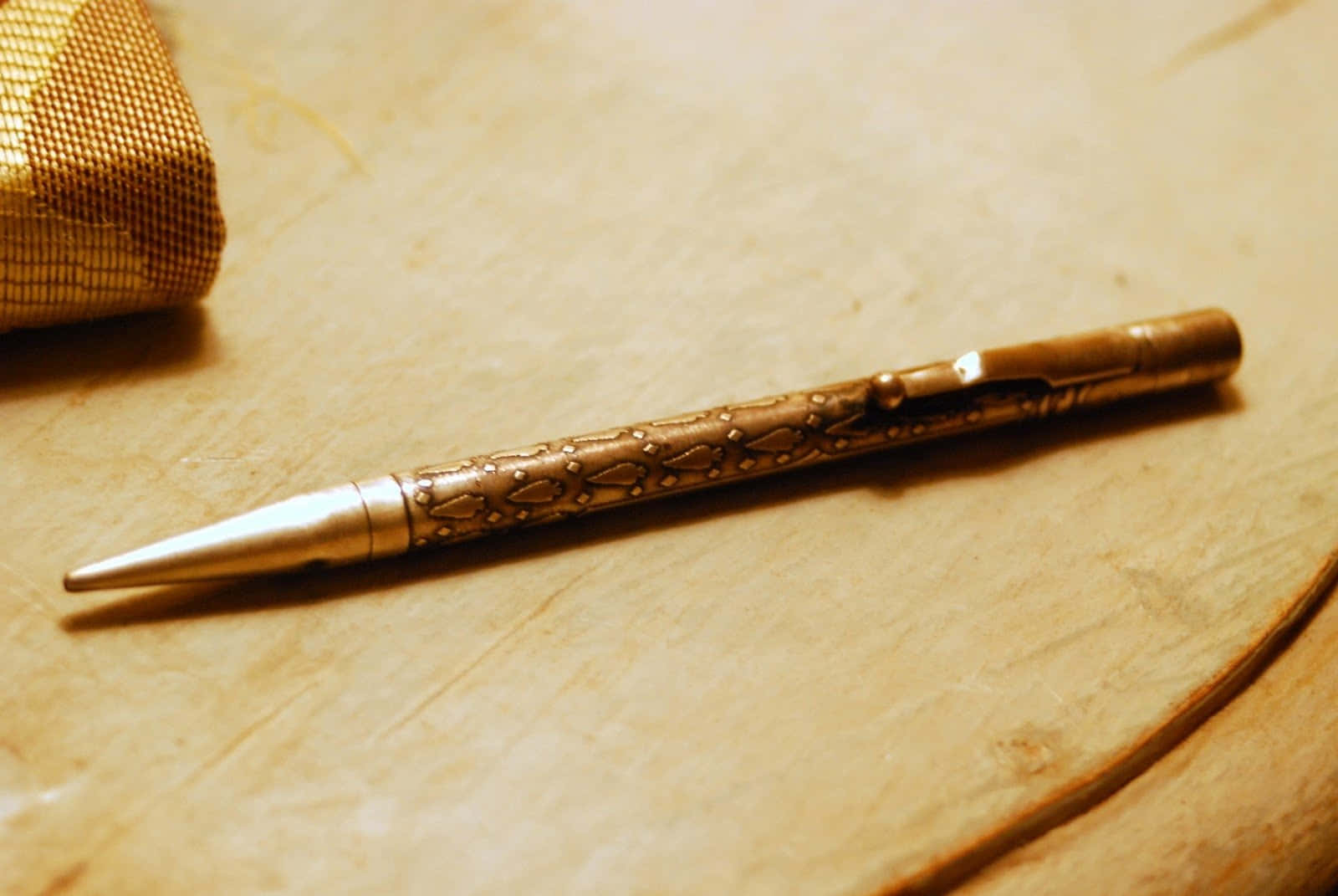 A Pen On A Wooden Table