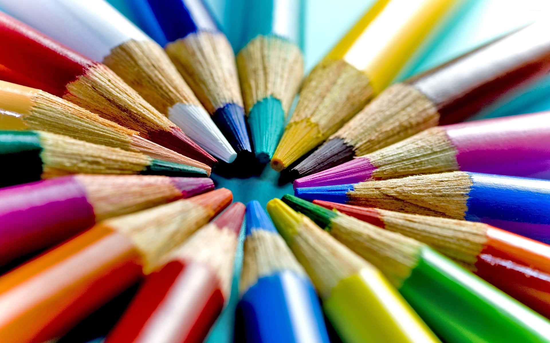 A Group Of Colored Pencils In A Circle