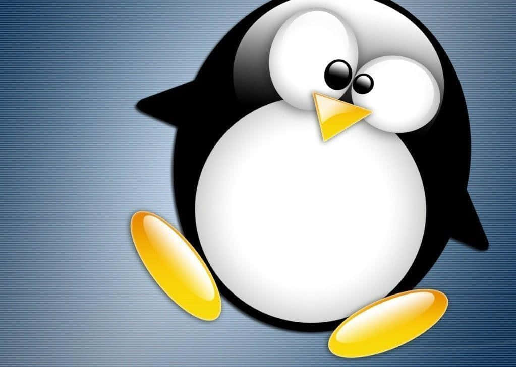 Unamigable Tux El Pingüino Se Erige Alto En Un Paisaje Digital Fondo de pantalla