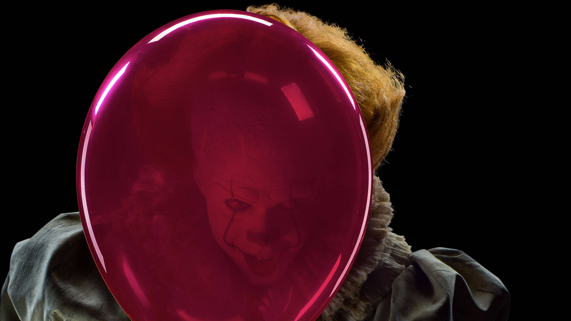 Pennywise Alongside a Red Balloon Wallpaper