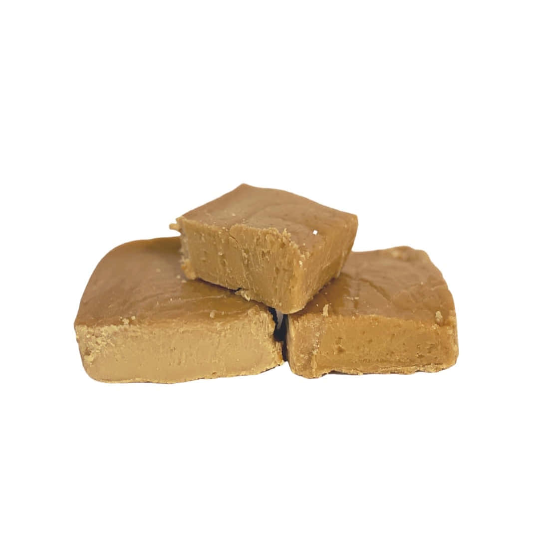 Mouthwatering Penuche Fudge on Wooden Table Wallpaper