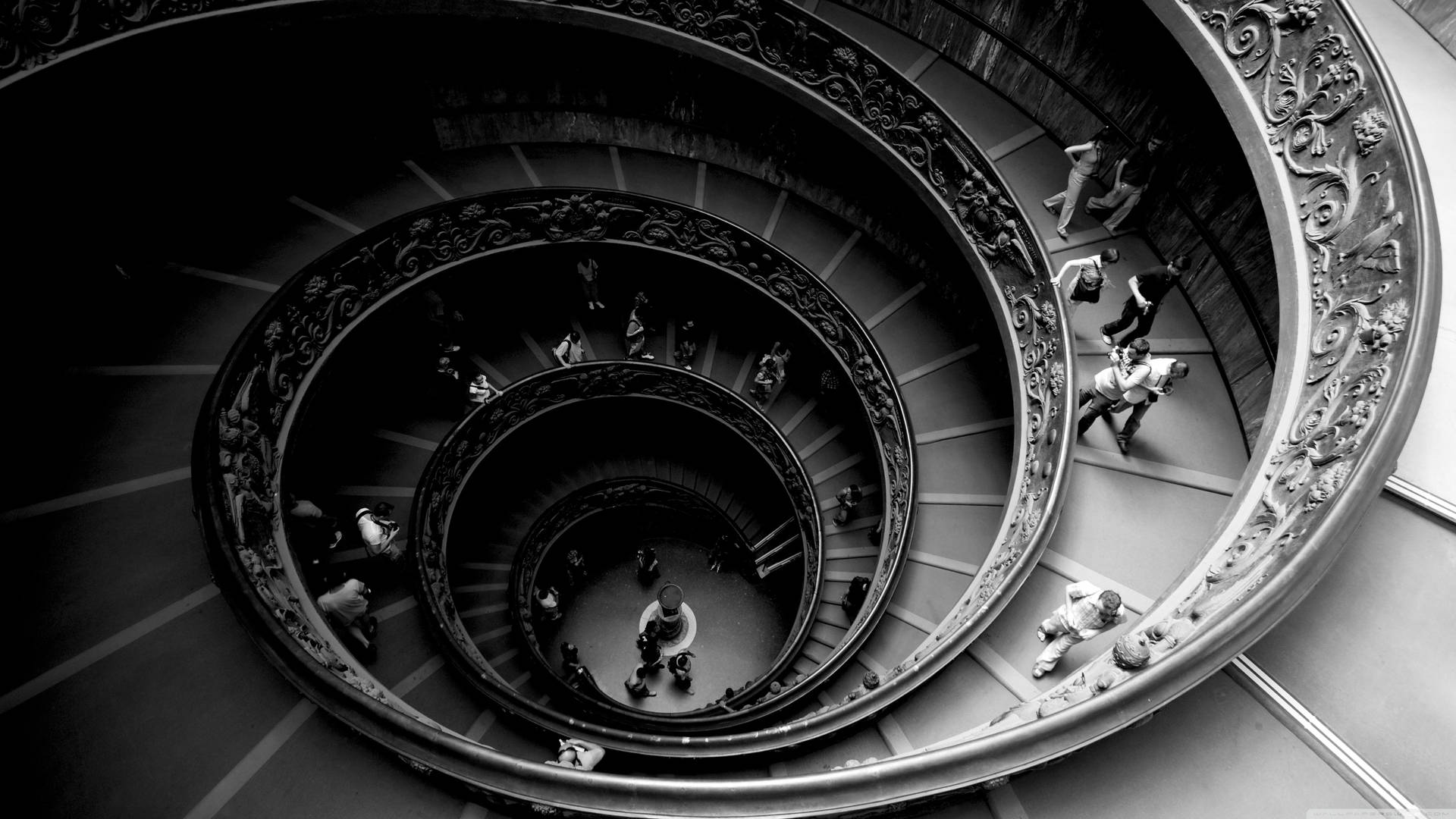 People In Spiral Staircase Wallpaper