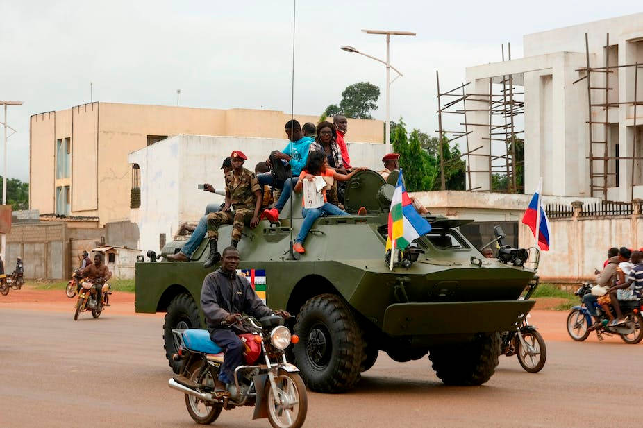 People On Tanks Central African Republic Background