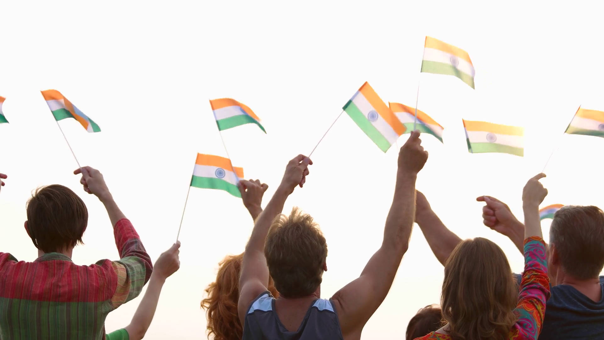 People Waving A Miniature Indian Flag Background