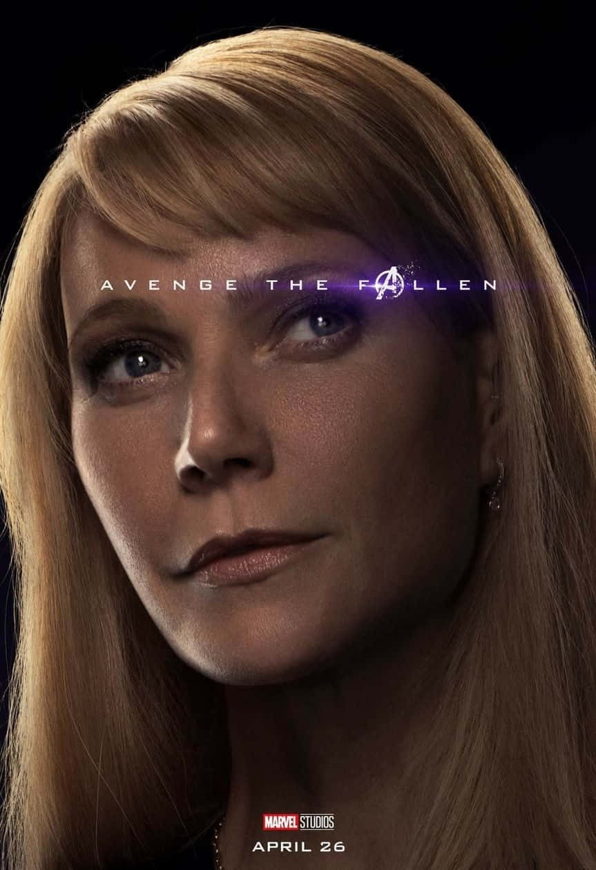 Pepper Potts striking a confident pose in her suit Wallpaper