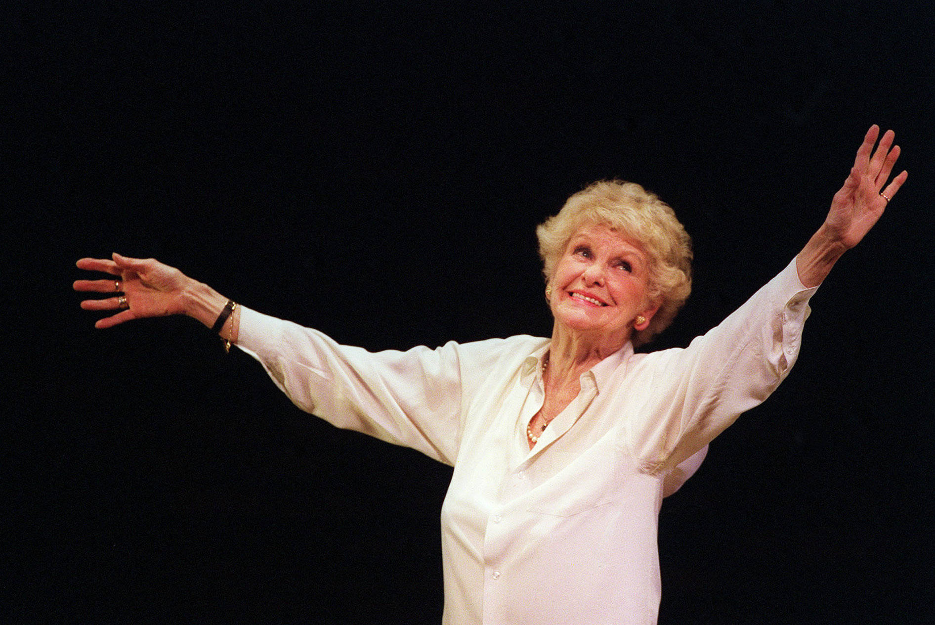 Performer Elaine Stritch Dancing On Stage Wallpaper