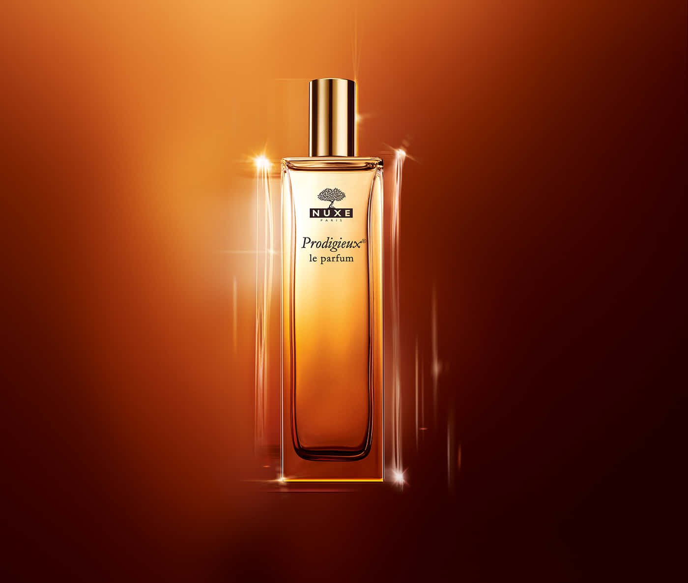 A Bottle Of Perfume On An Orange Background