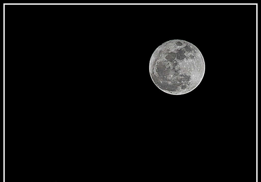 Stunning Perigee Moon illuminating the night sky Wallpaper