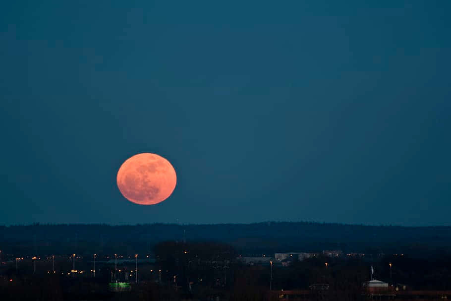 Stunning Perigee Moon Illuminating Night Sky Wallpaper