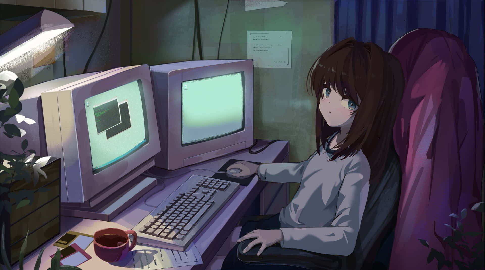 A Girl Sitting At A Desk With Two Computers Wallpaper