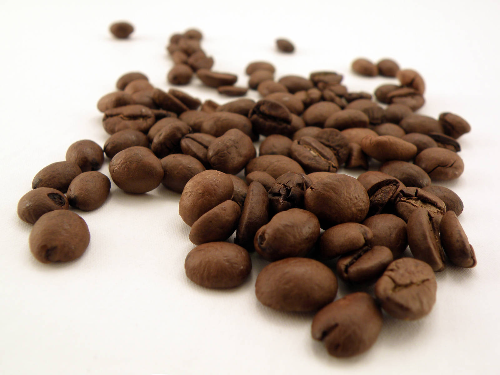 Perpsective Image Of Coffee Beans Wallpaper