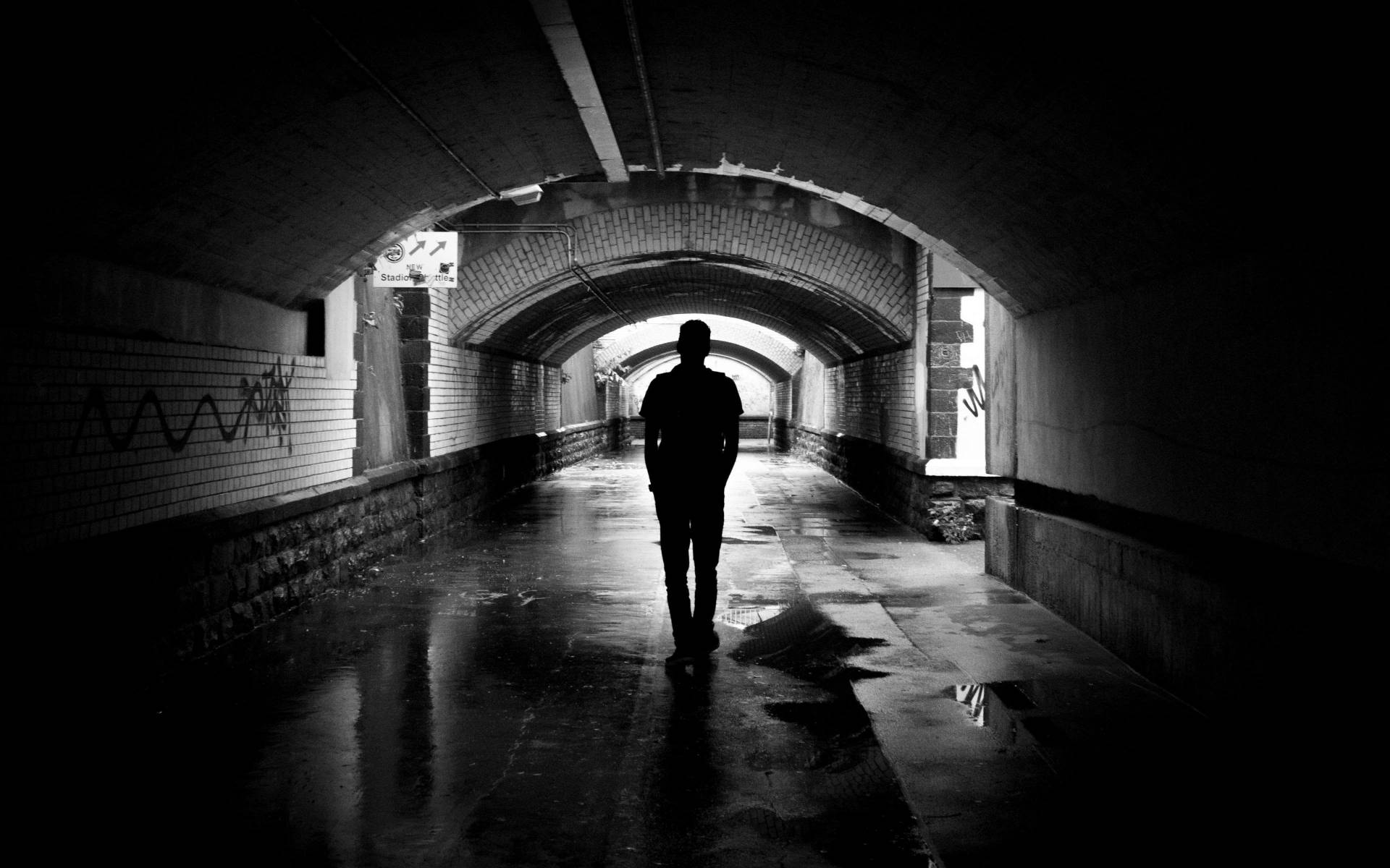 Person Alone In Underpass Background