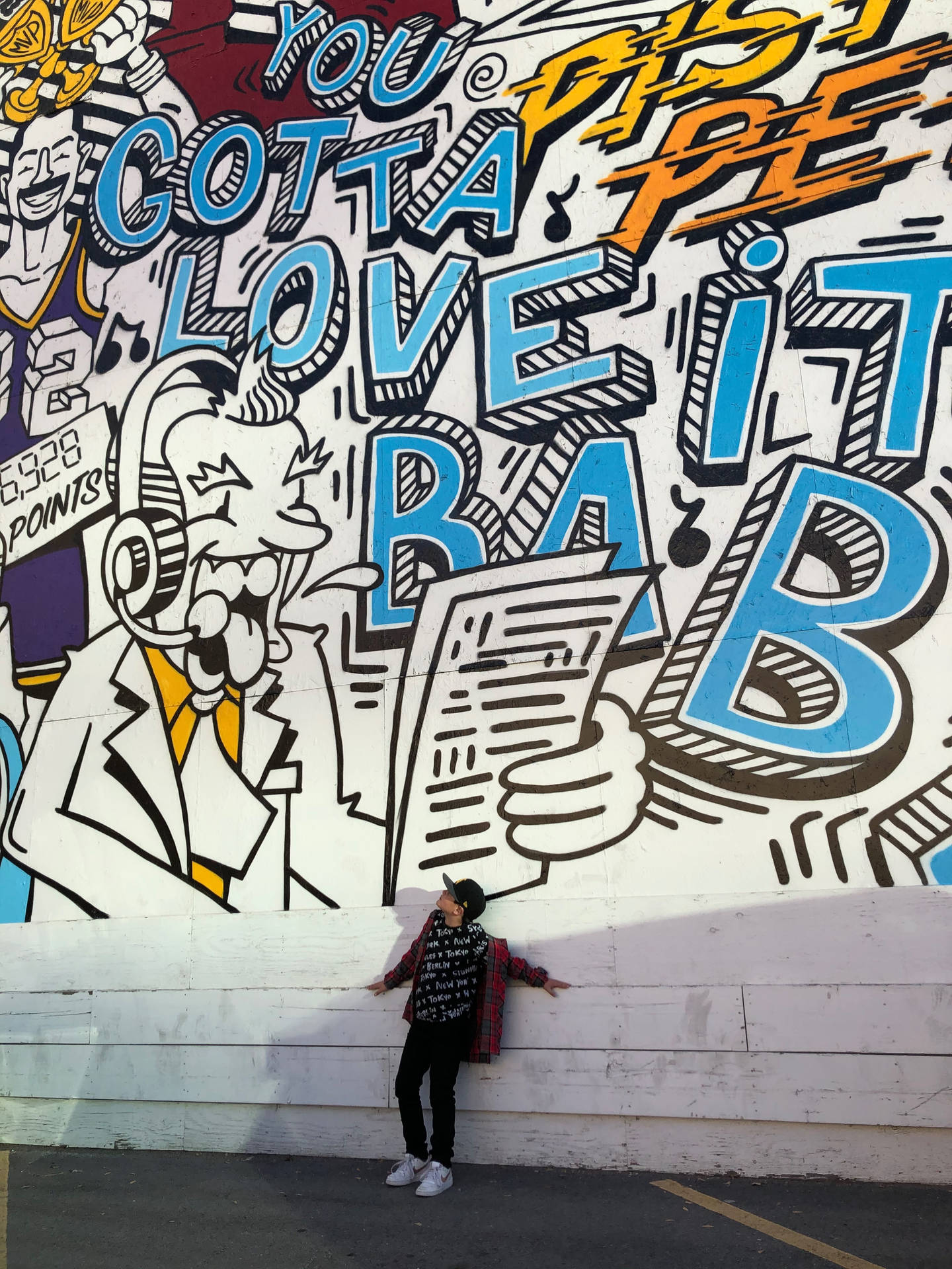 Person Posing Beside Cool Graffiti wallpaper 