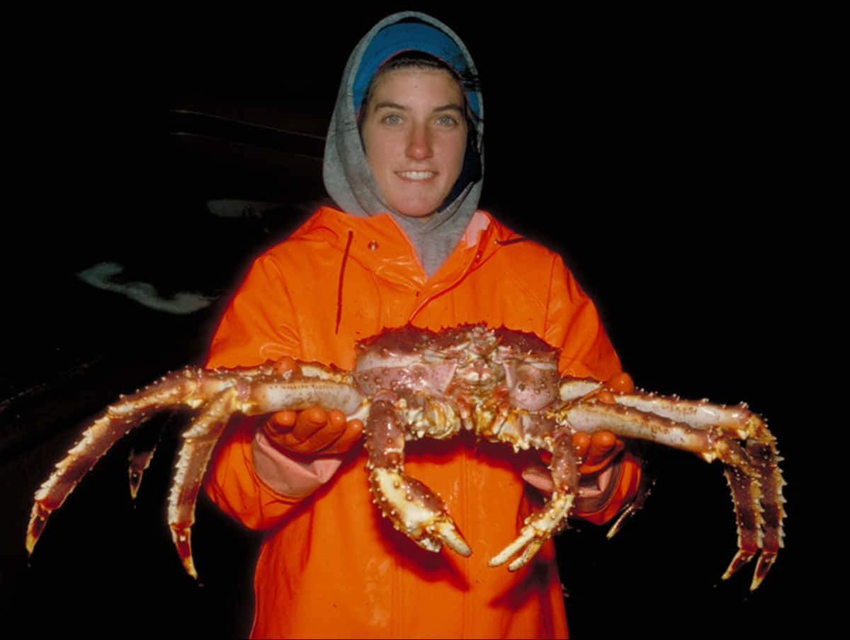 Person Holding Large Crab Wallpaper