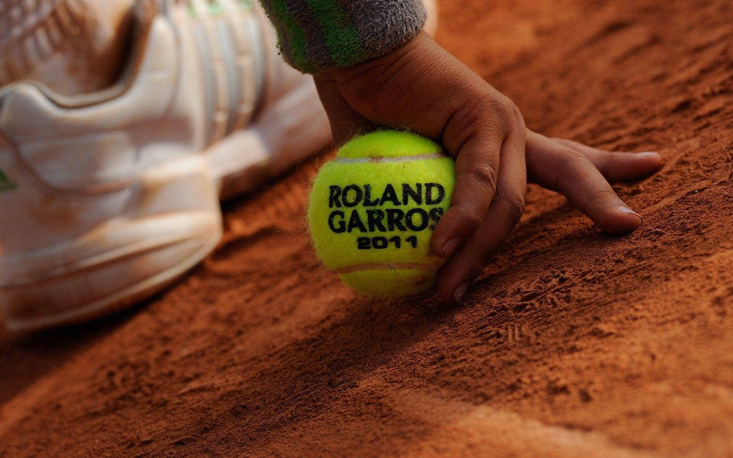 Person With French Open Tennis Ball Wallpaper