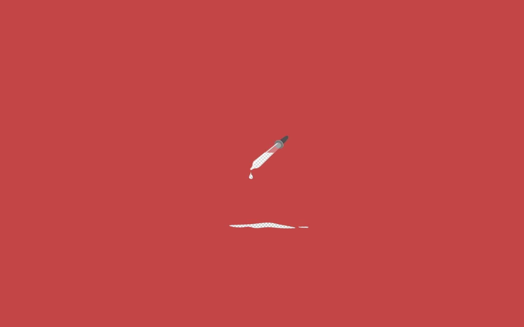 A Pen Is Laying On A Red Background