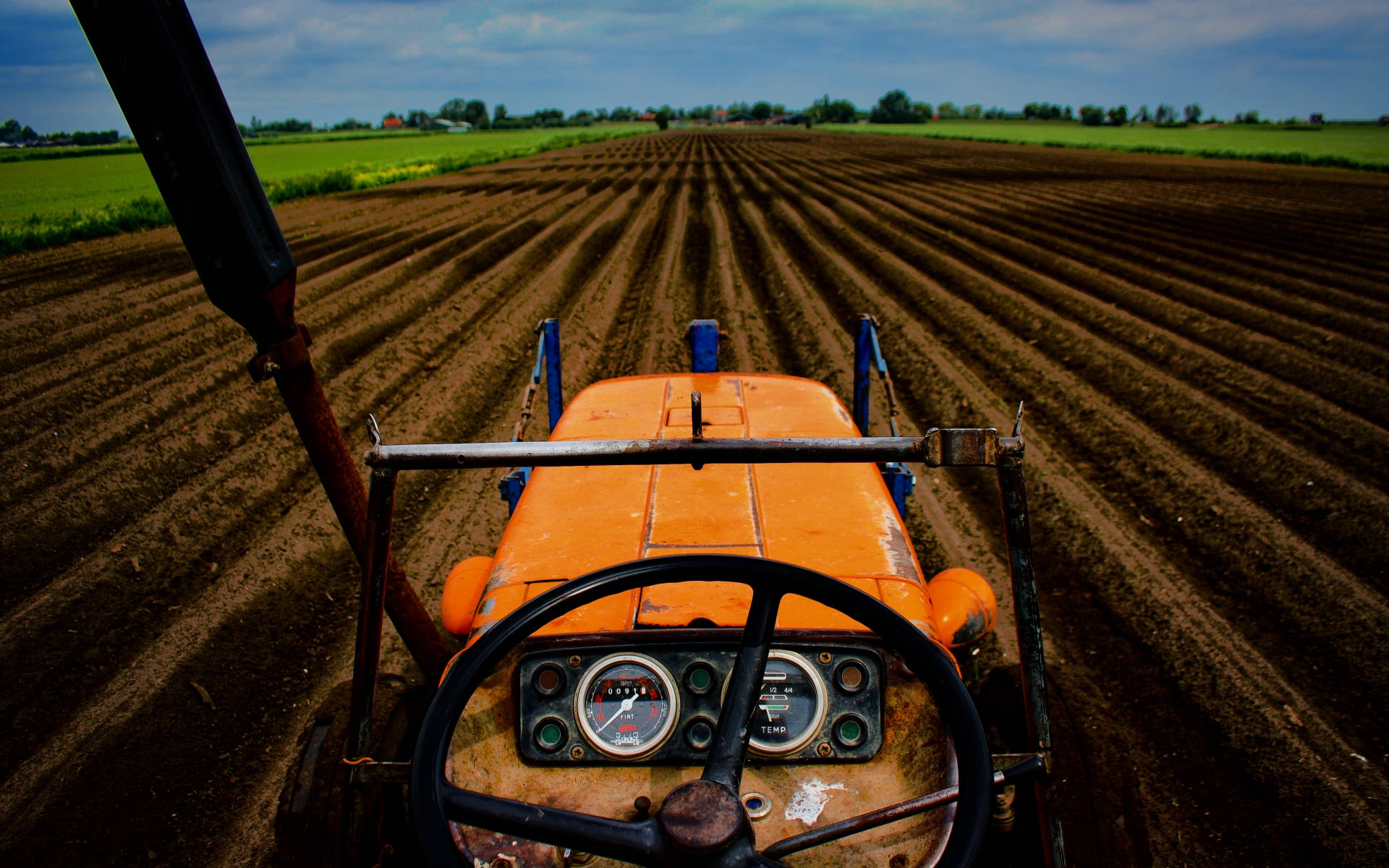 Perspective Of A Tractor Driver Wallpaper