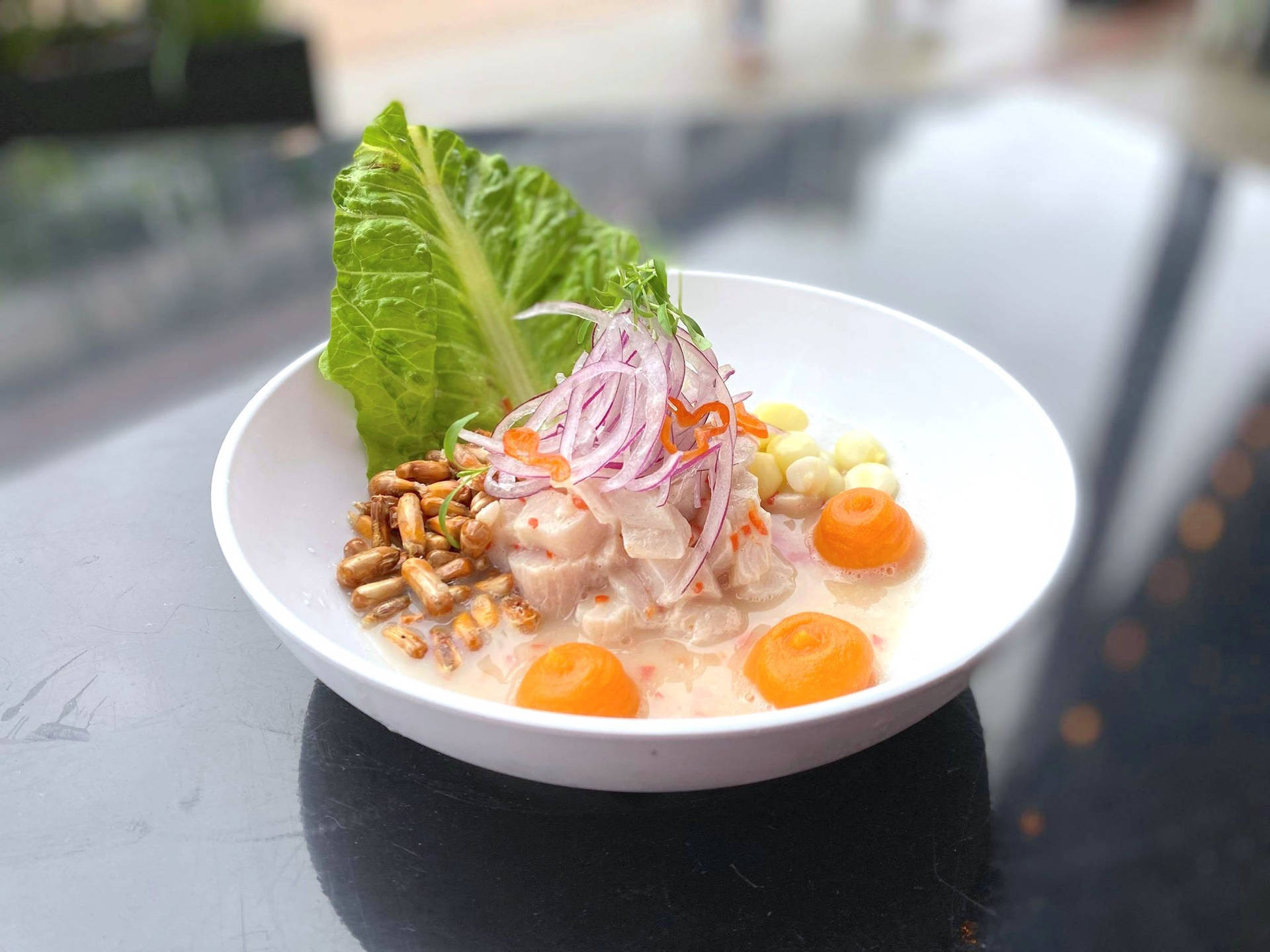 Peruvian Ceviche Garnished With Corn Nuts Wallpaper