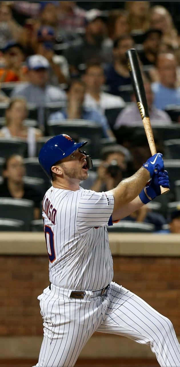 Pete Alonso celebrates after winning the 2019 Home Run Derby Wallpaper