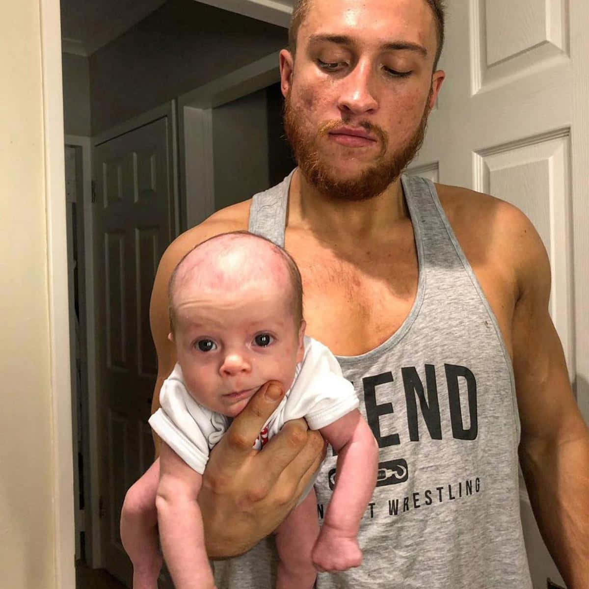 Pete Dunne Carrying His Baby Wallpaper