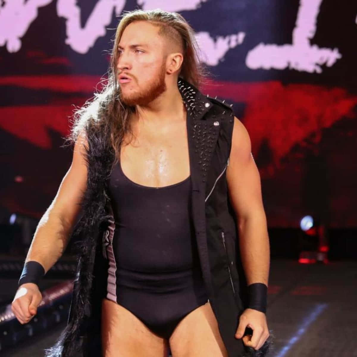 Pete Dunne Grimacing During His Entrance Background