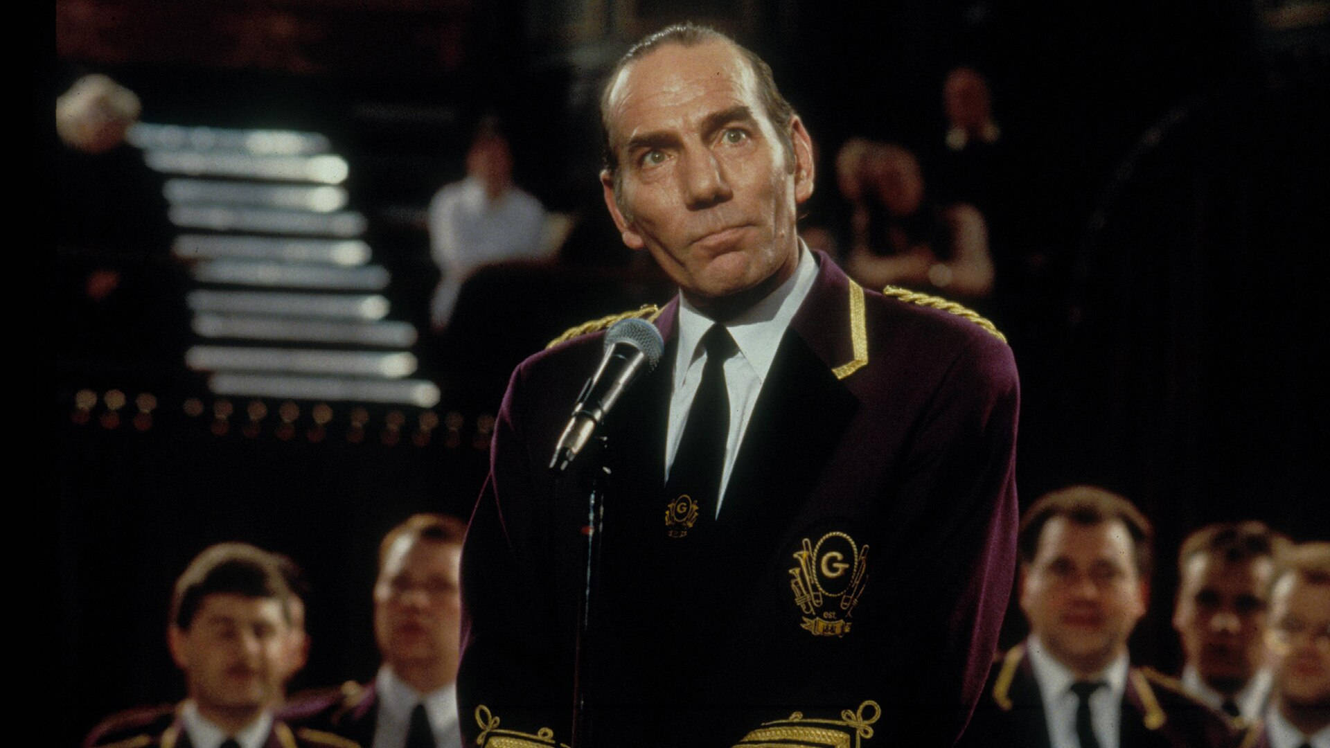 Legendary actor Pete Postlethwaite in a still from the movie Brassed Off Wallpaper