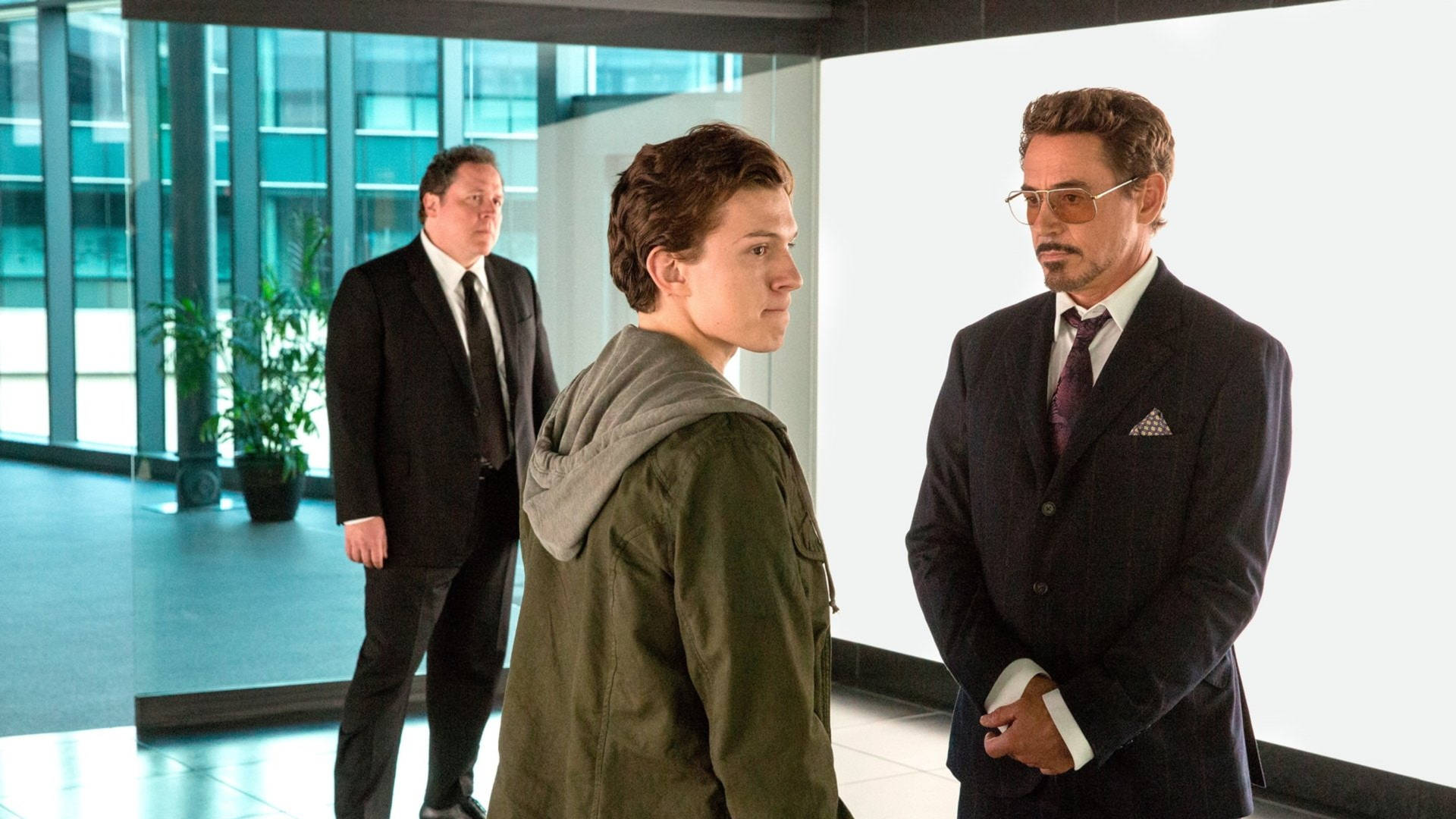 Peter Parker Con Tony Stark E Felice Sfondo
