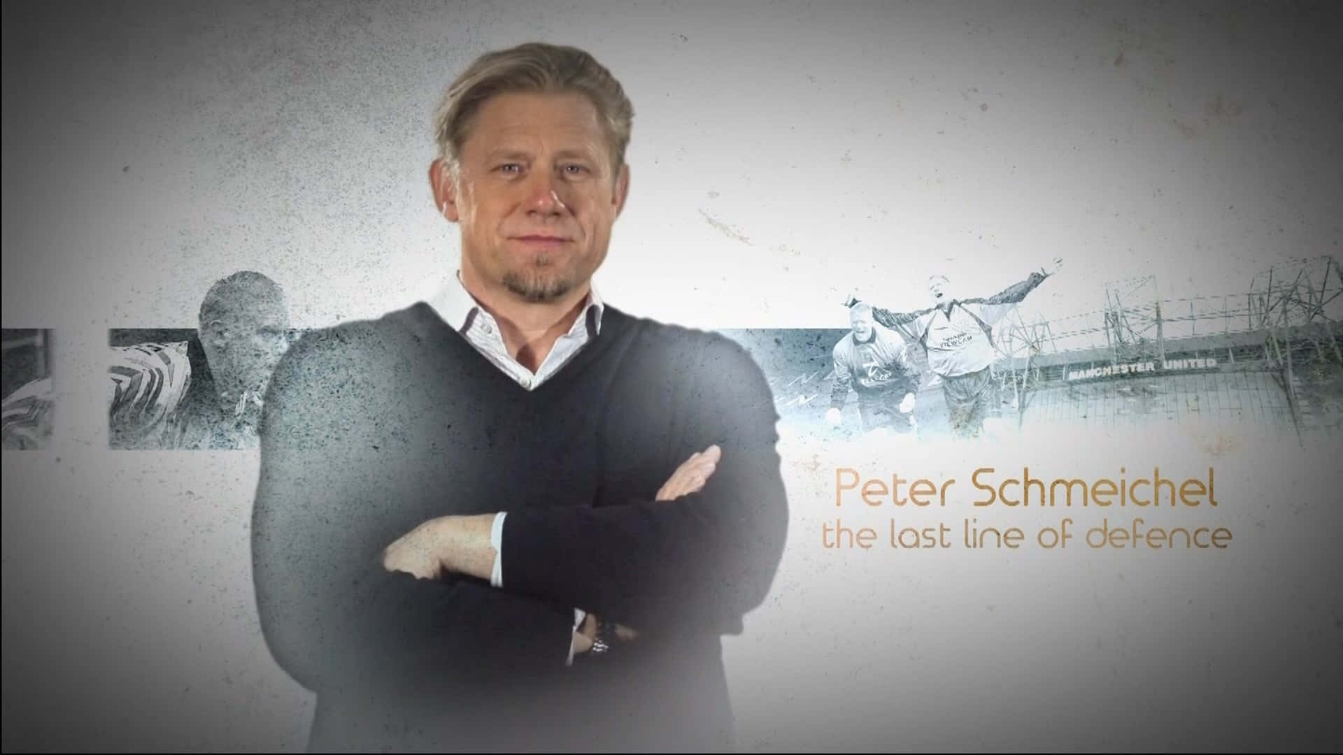 Legendary Goalkeeper Peter Schmeichel In Action Wallpaper