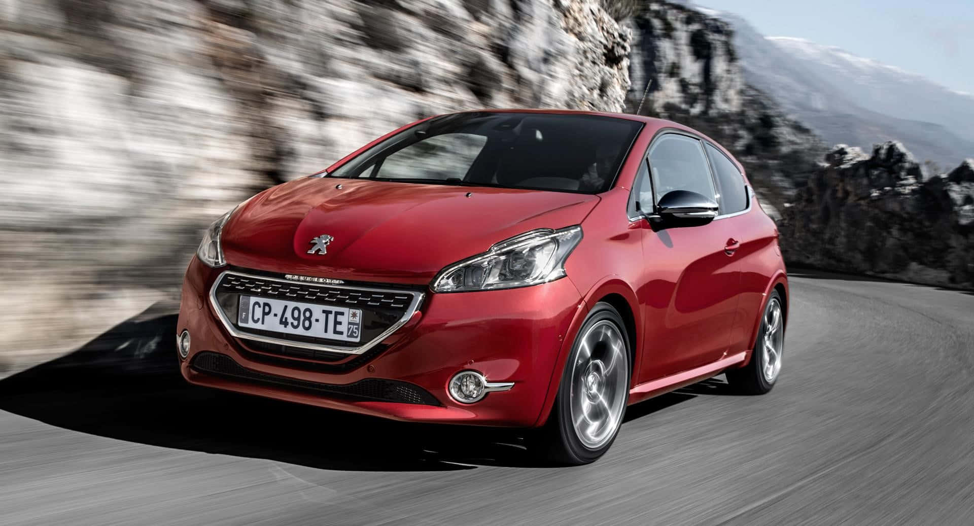 Captivating Peugeot 208 in Action Wallpaper