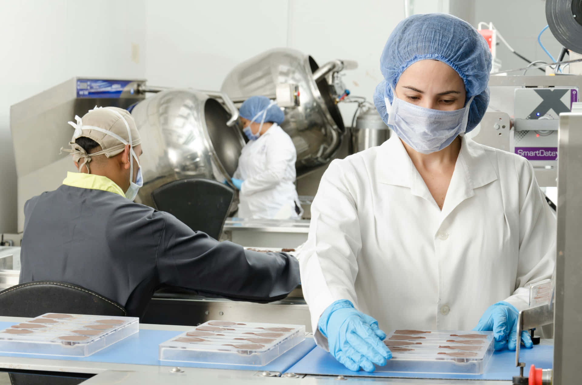 Pharmaceutical Production Line Workers.jpg Wallpaper