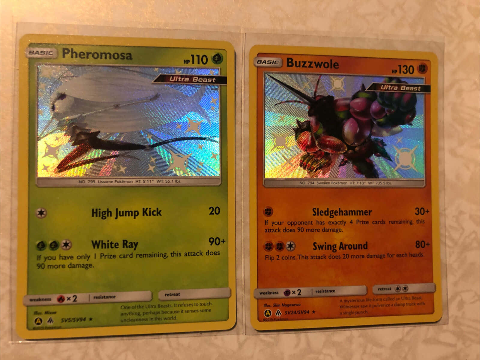 Pheromosa and Buzzwole Trading Cards - Window Into the Pokémon World Wallpaper