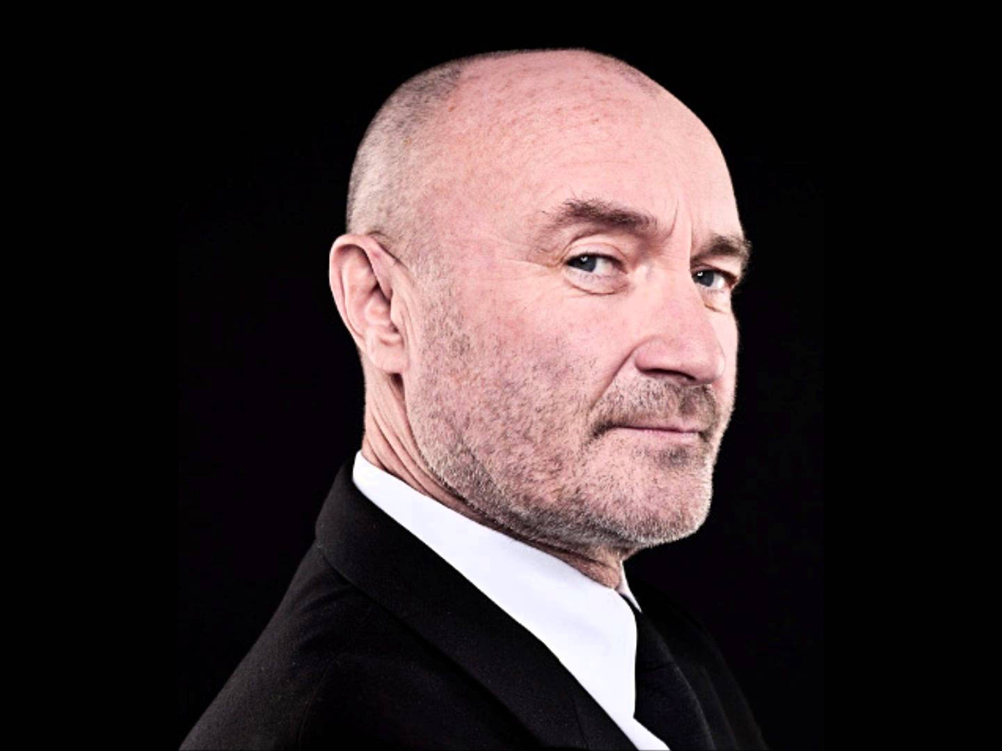Phil Collins i sort tuxedo og bow tie Wallpaper