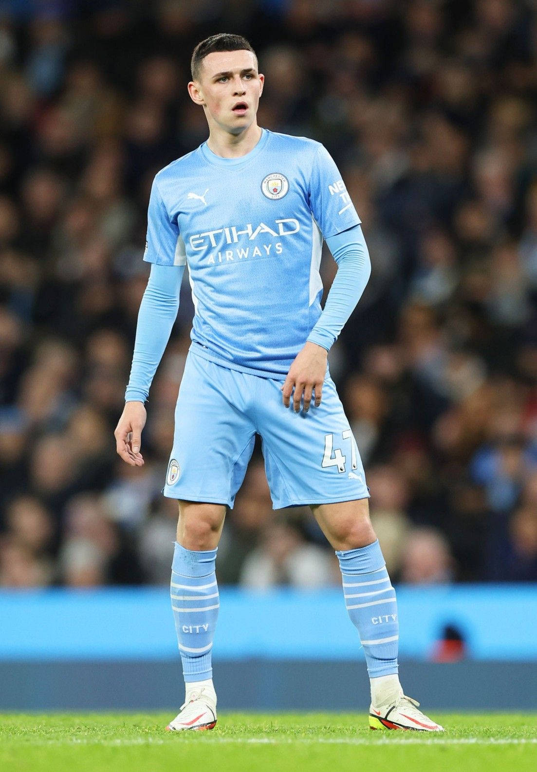Phil Foden In Field Action Wallpaper