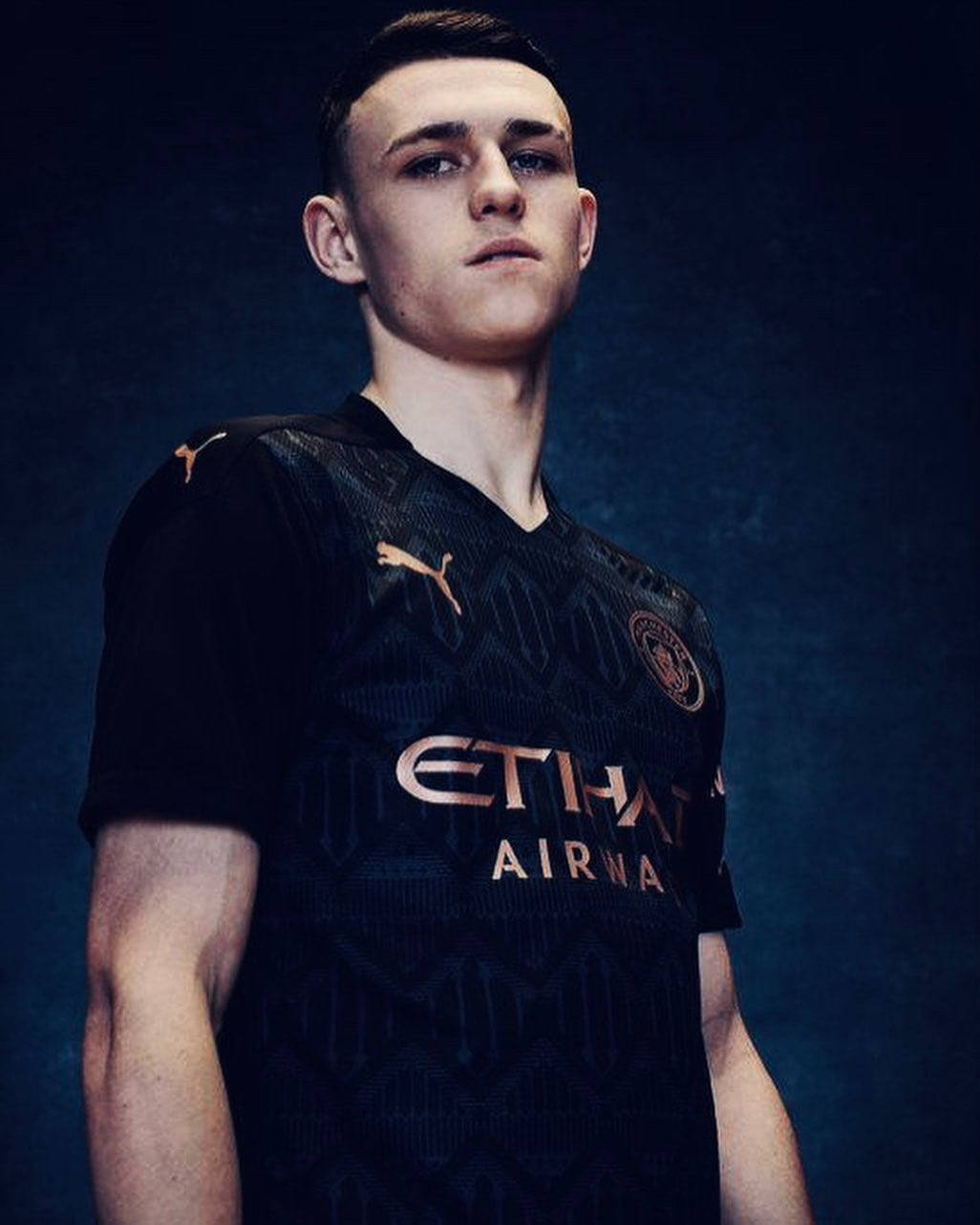 Phil Foden Promo Photo In Black Jersey Wallpaper